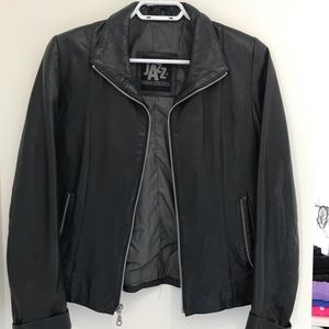 Black faux leather jacket.